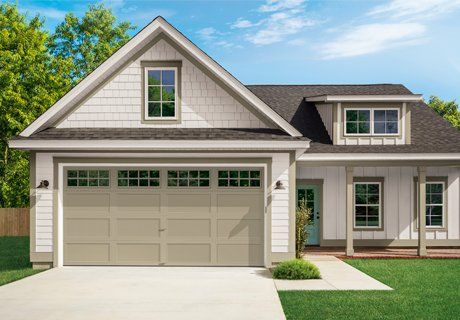 Tan Craftsman-style house with a garage, white trim, and a light blue door.