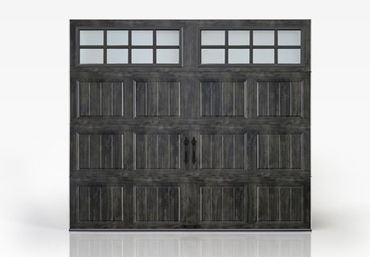 Gray wooden garage door with glass panel windows.