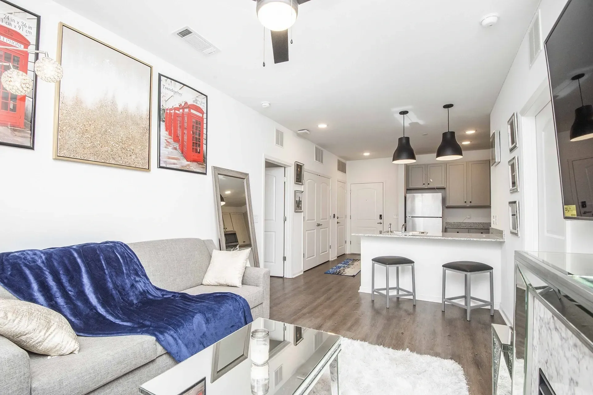 Modern living area with sofa and kitchen island