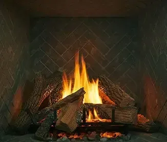 A fireplace with a lot of flames coming out of it