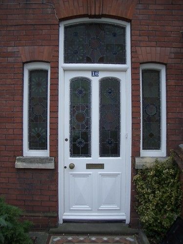 Ornate insert glass in a front door.