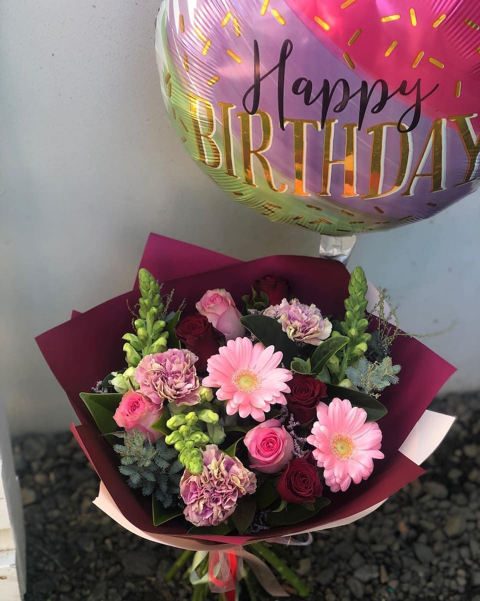 A Bouquet Of Pink Flowers Next To A Happy Birthday Balloon — Clover Country Flowers and Gifts In Toowoomba, QLD