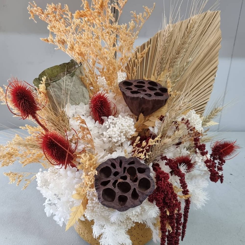A Vase Filled With Dried Flowers And Leaves — Clover Country Flowers and Gifts In Toowoomba, QLD