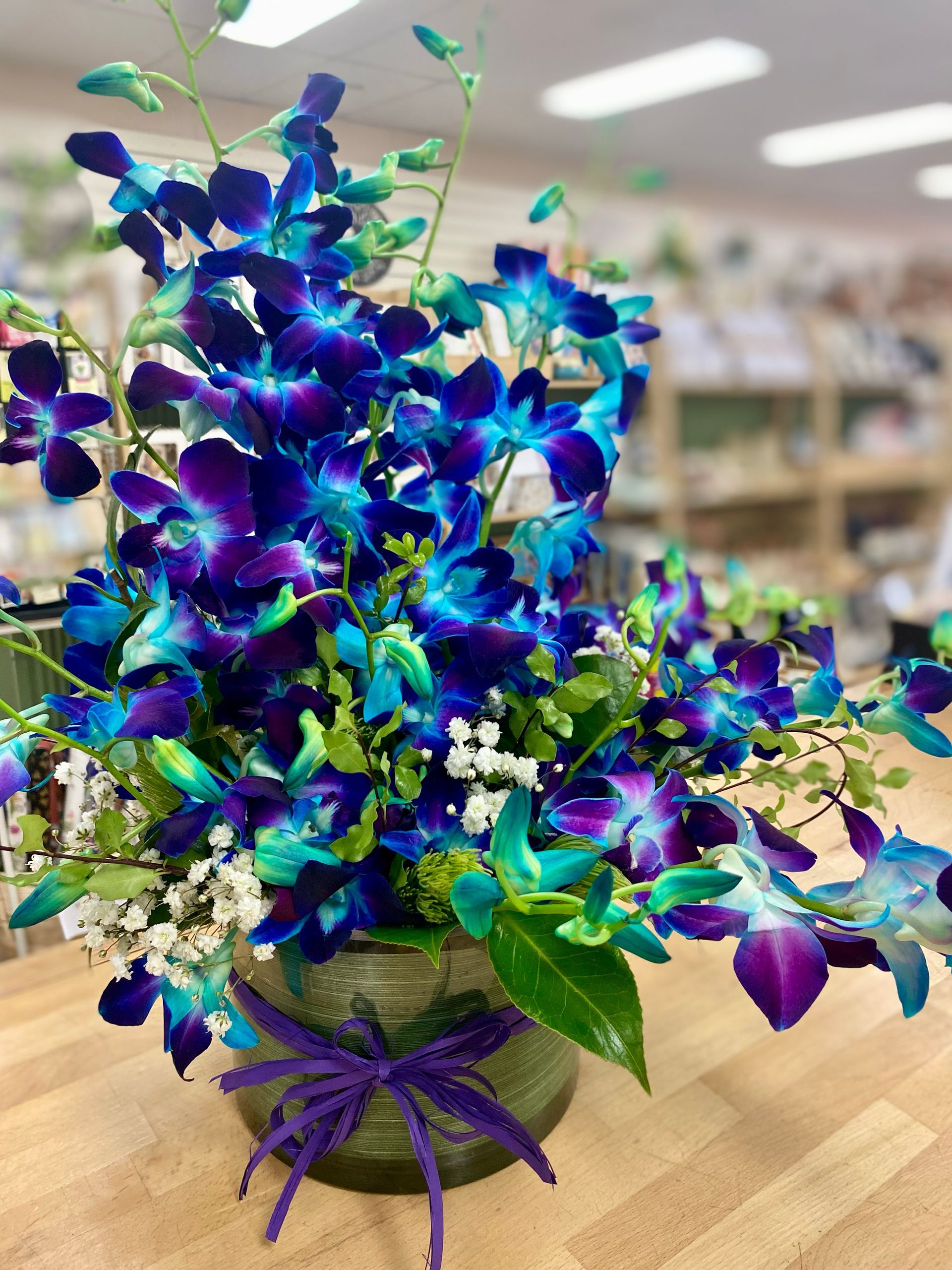 A Vase Filled With Pink And White Flowers Is Sitting On A Wooden Table — Clover Country Flowers and Gifts In Pittsworth, QLD