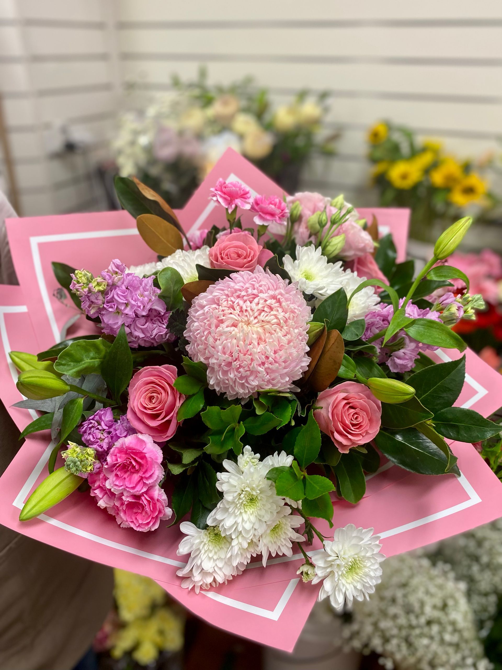 A Bunch Of Pink And Purple Flowers Are In A Pink Box — Clover Country Flowers and Gifts In Pittsworth, QLD