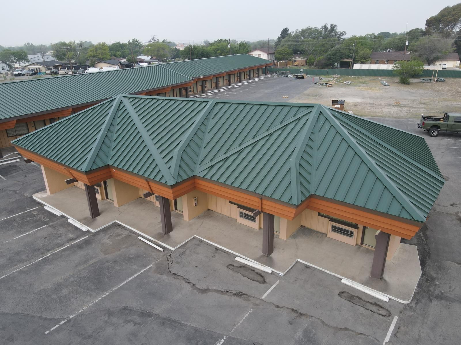 green newly installed commercial roof