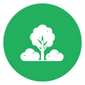 White tree and bushes icon on a green circular background