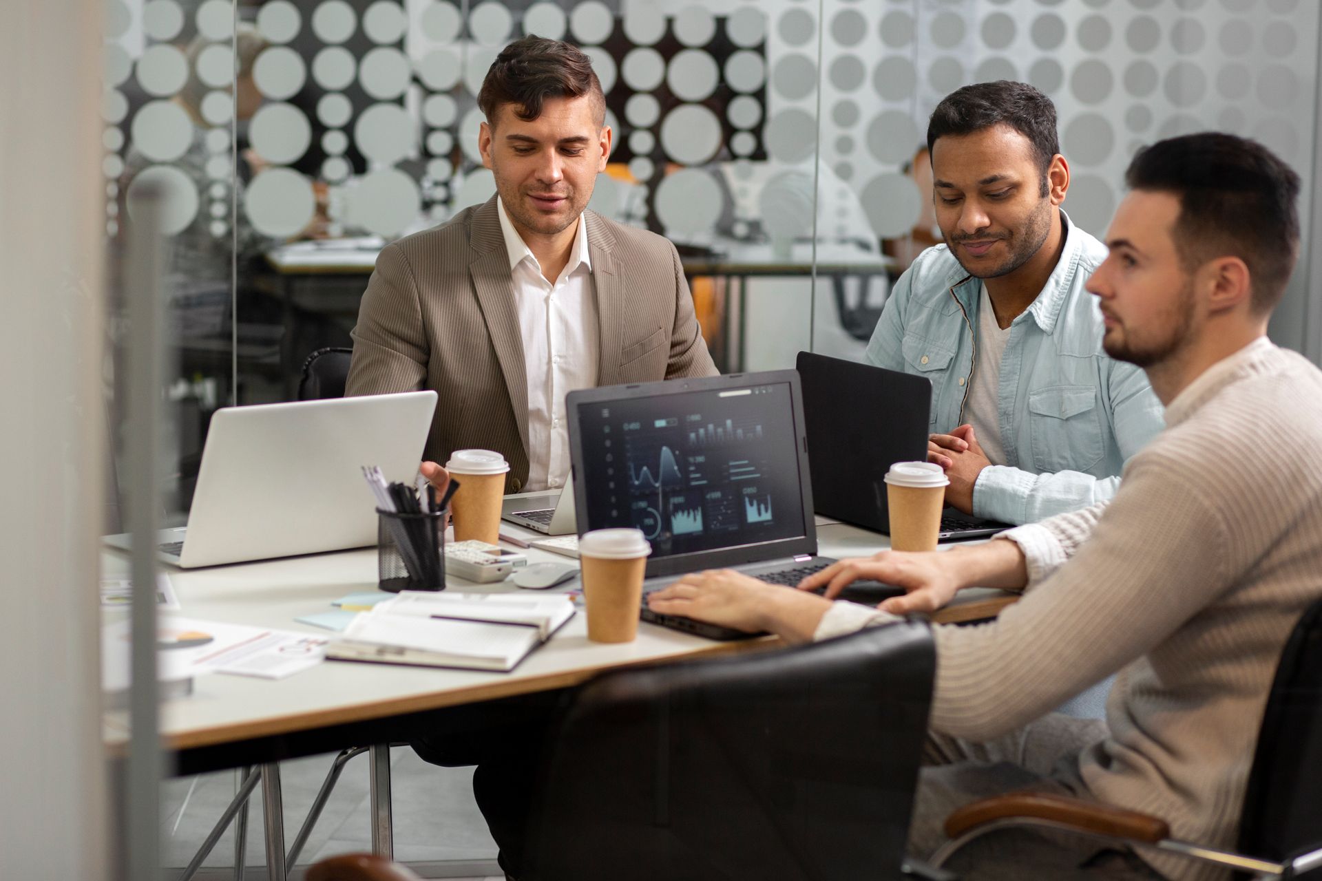 Business professionals discussing AI guardrails strategy