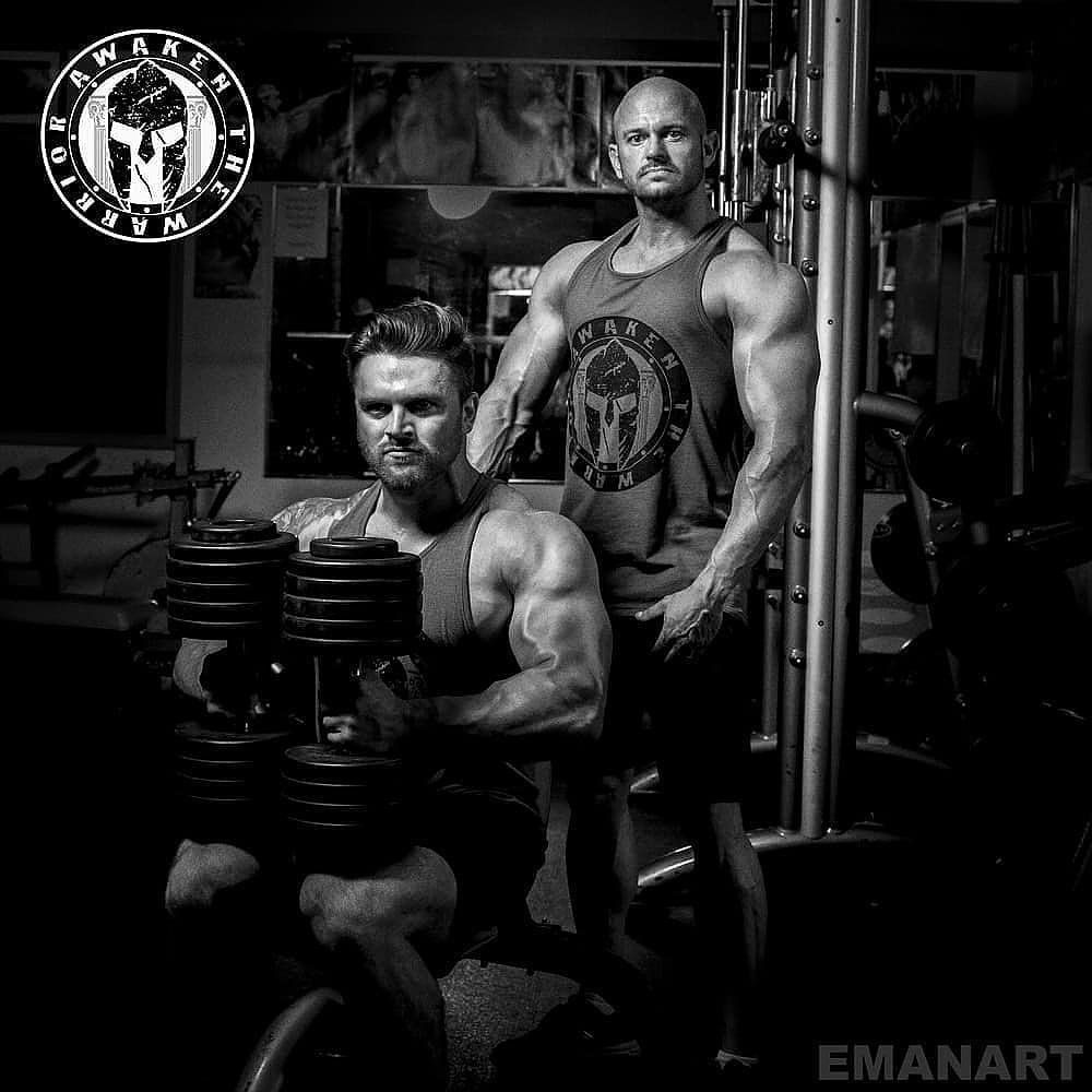 Two Man Working Out In Joe's Gym