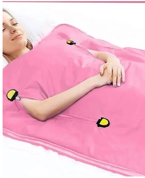 A woman is laying in a pink sleeping bag.