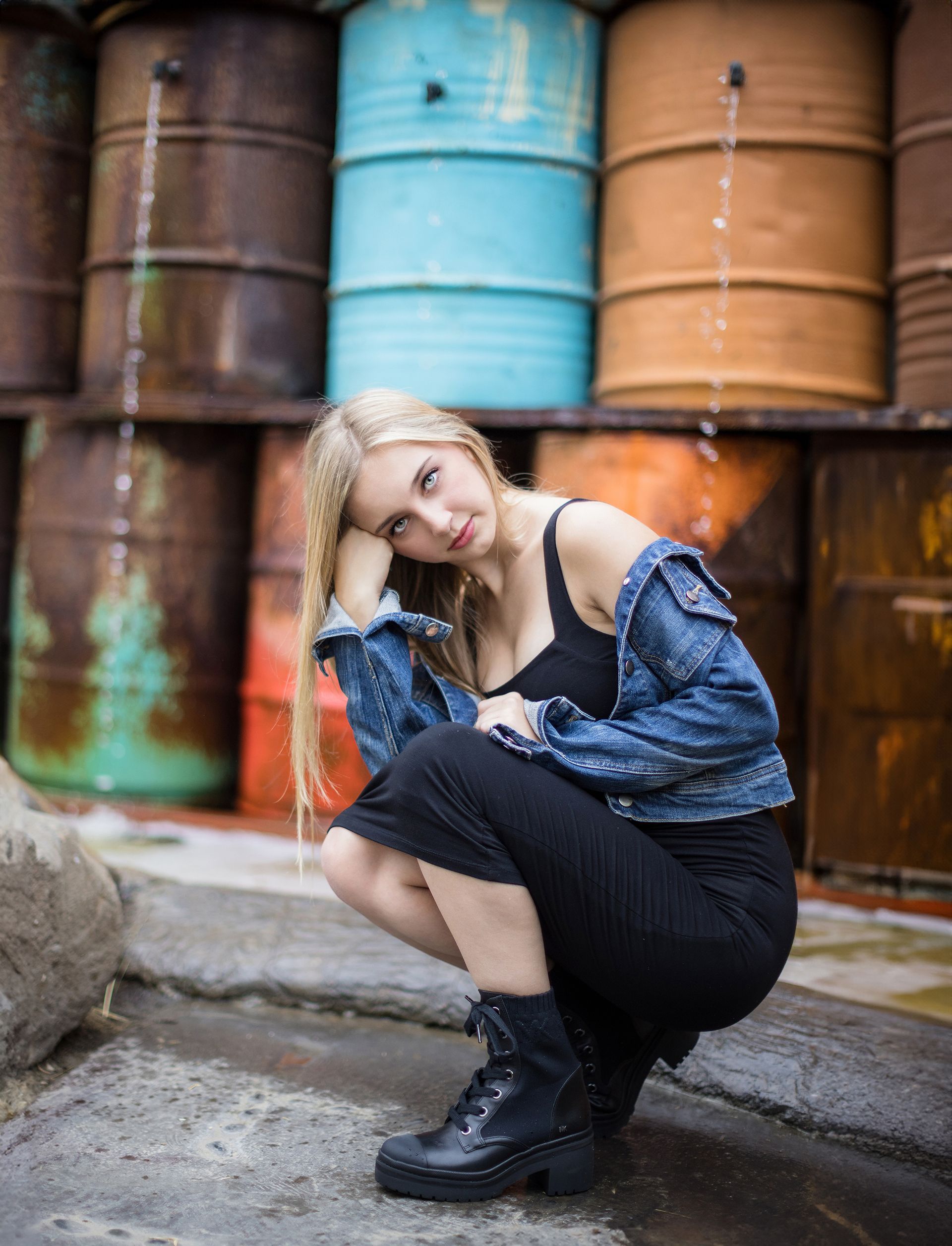 Senior girl with a black dress and denim jacket