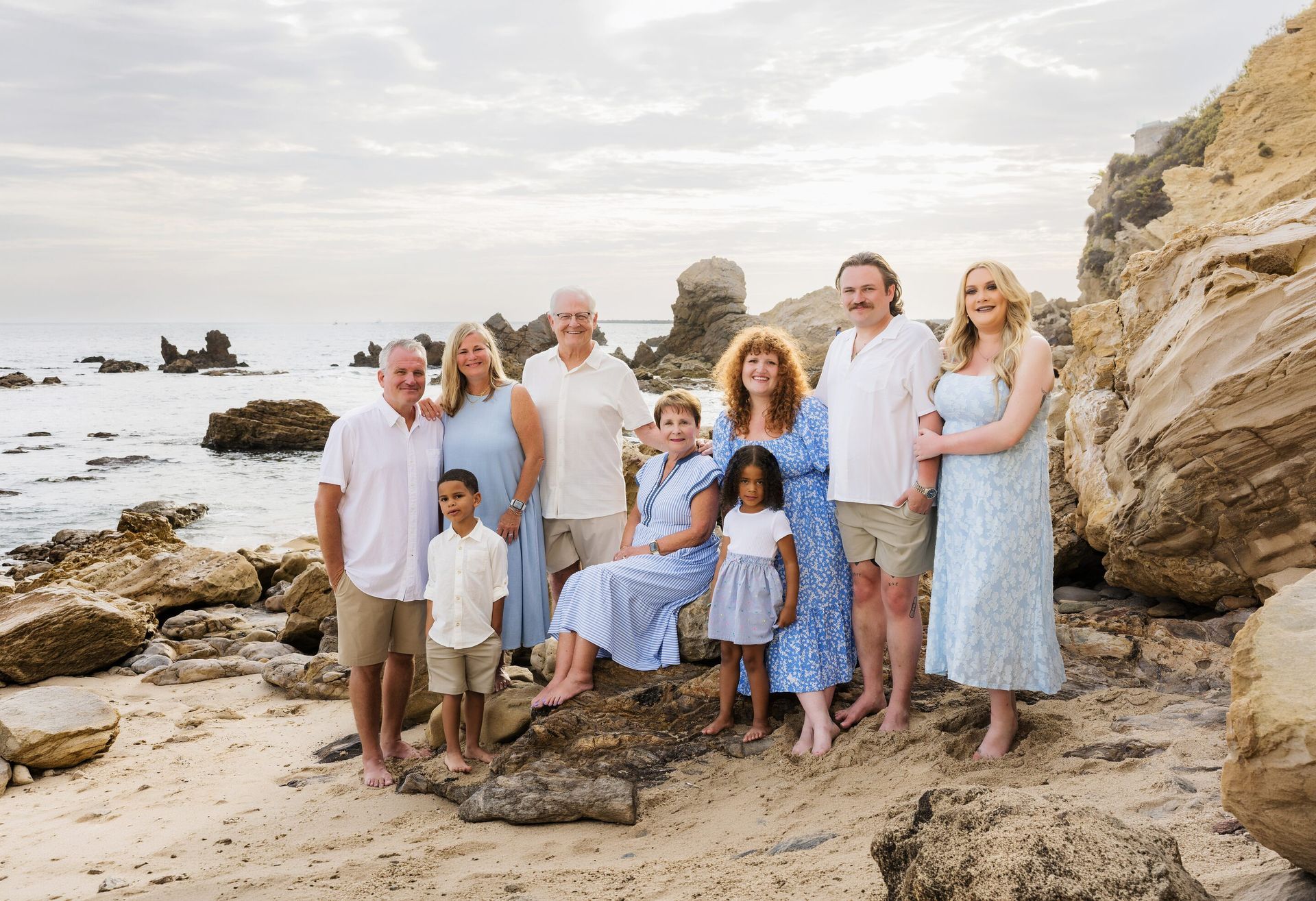 Family portrait on the rocks at Little Corona Beach, Corona del Mar