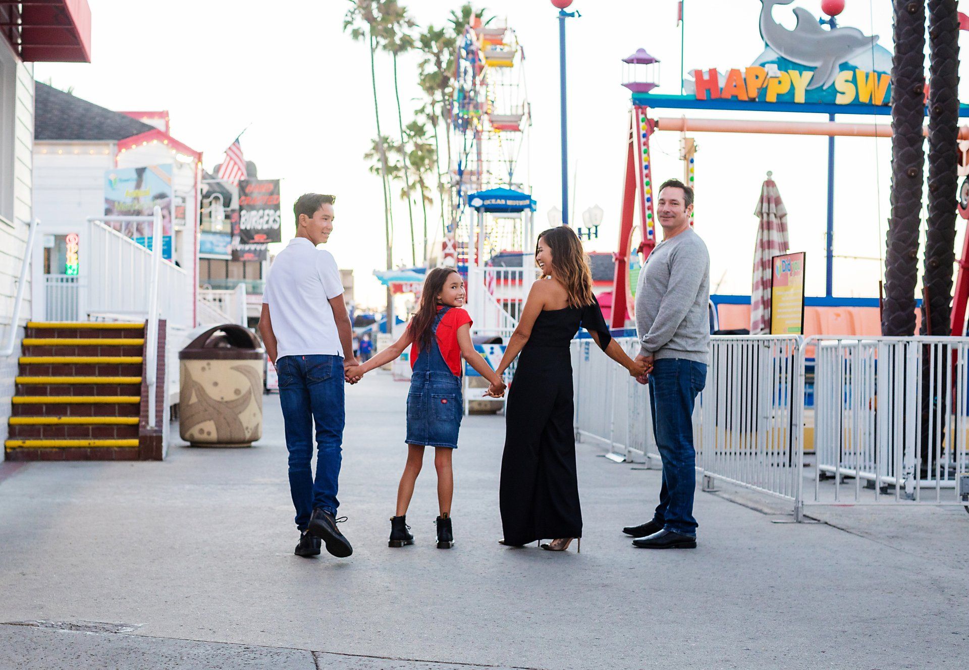 Family portrait at the Balboa Fun Zone in Newport Beach, Orange County