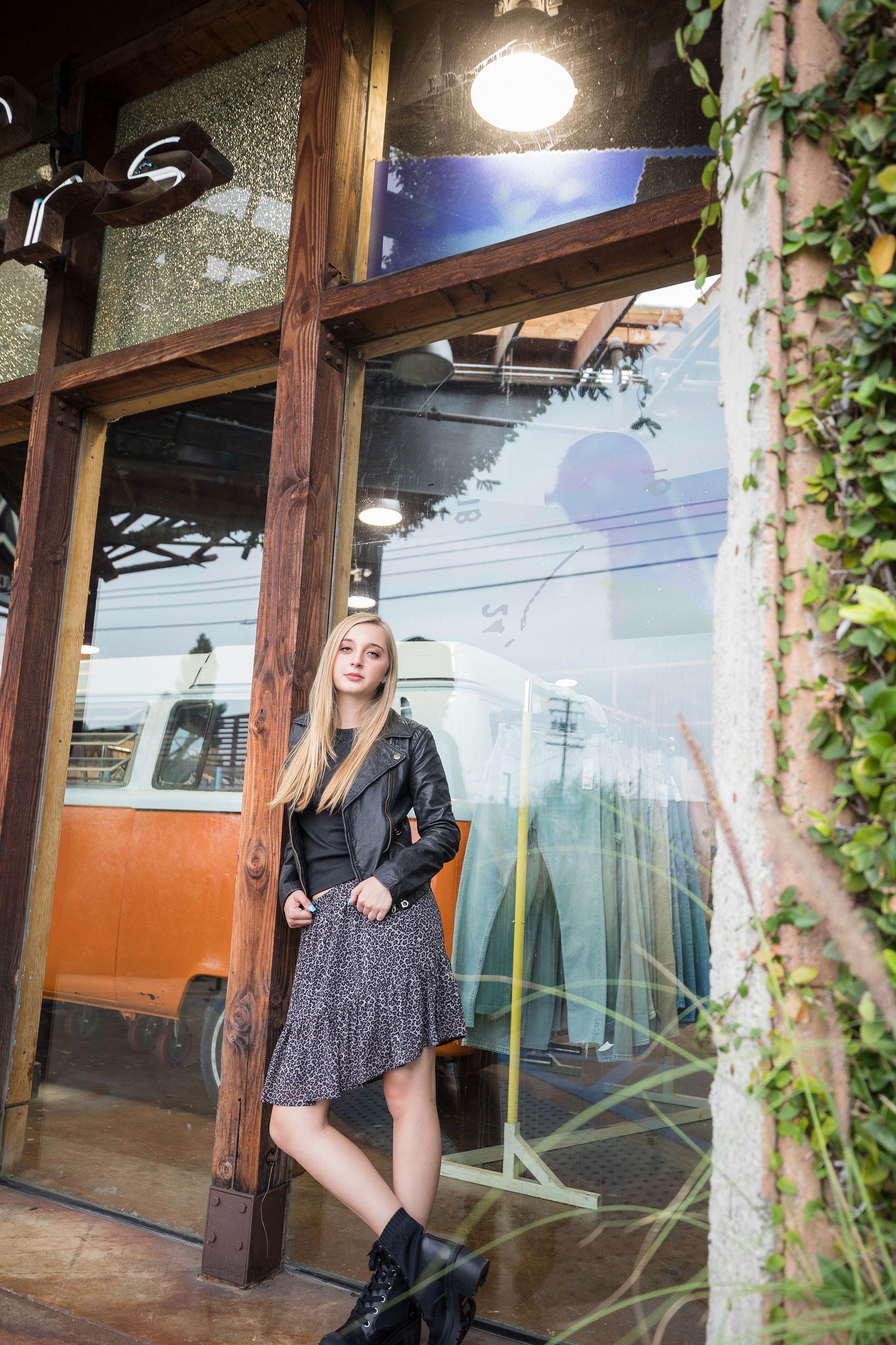 Senior girl in a doorway at The LAB anti-mall in Costa Mesa