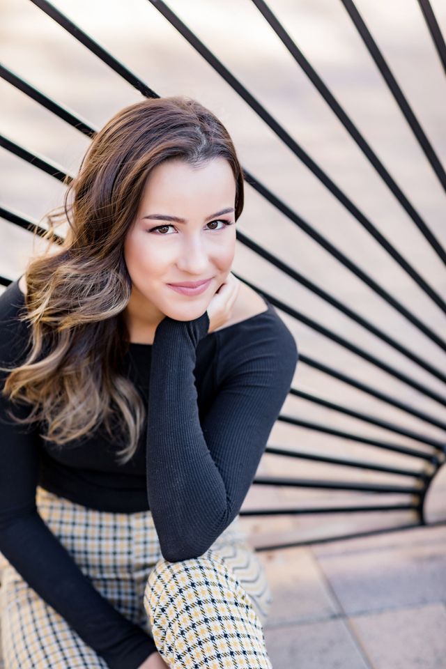 Senior girl against a striped wall, Orange County