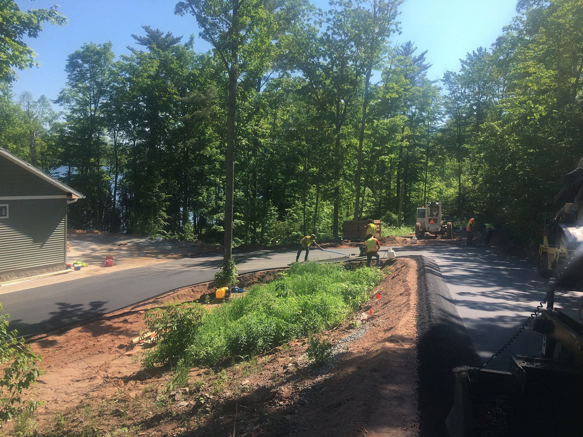 A road is being built in the middle of a forest.