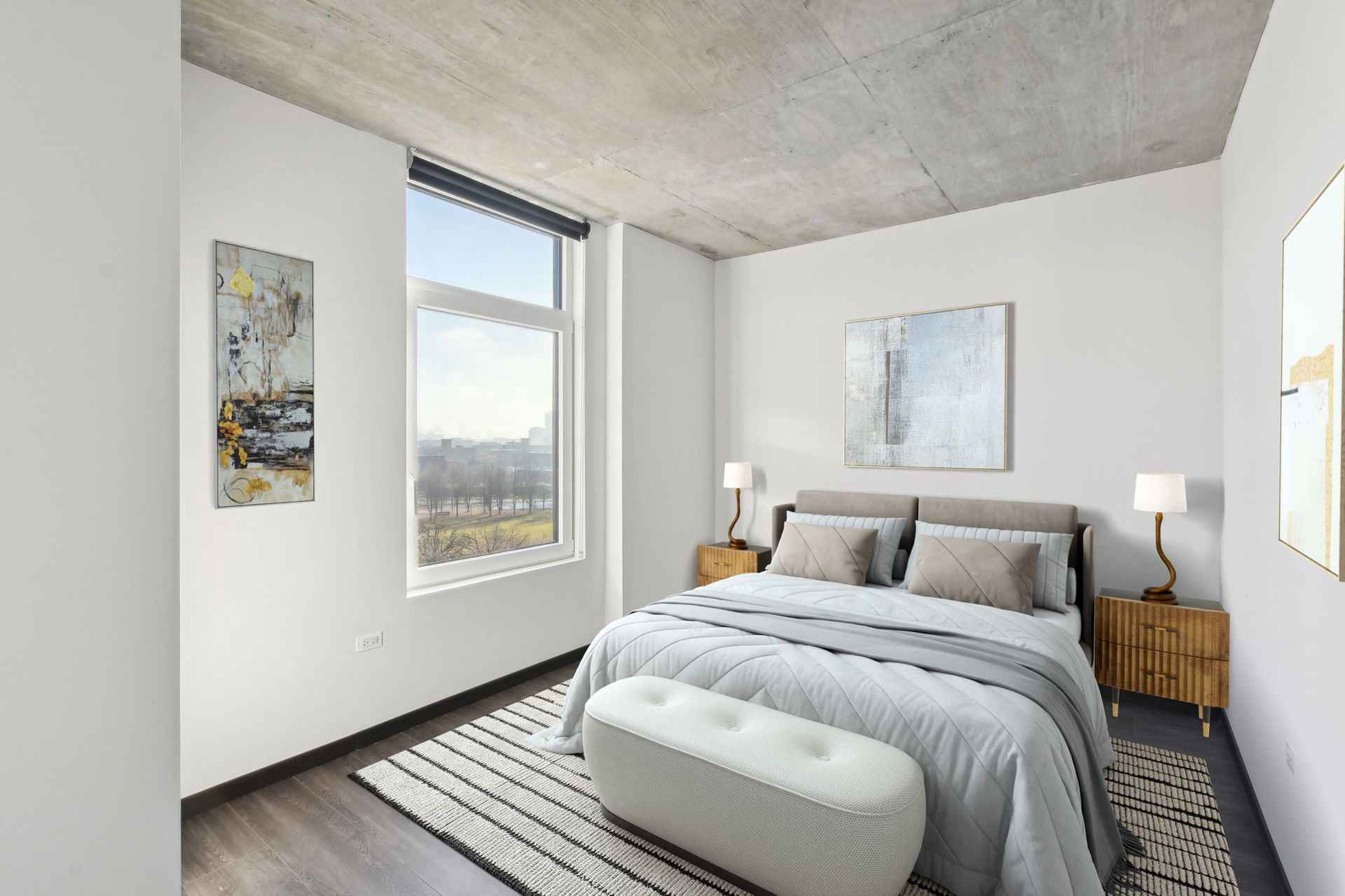 A bedroom with a large bed and a window.