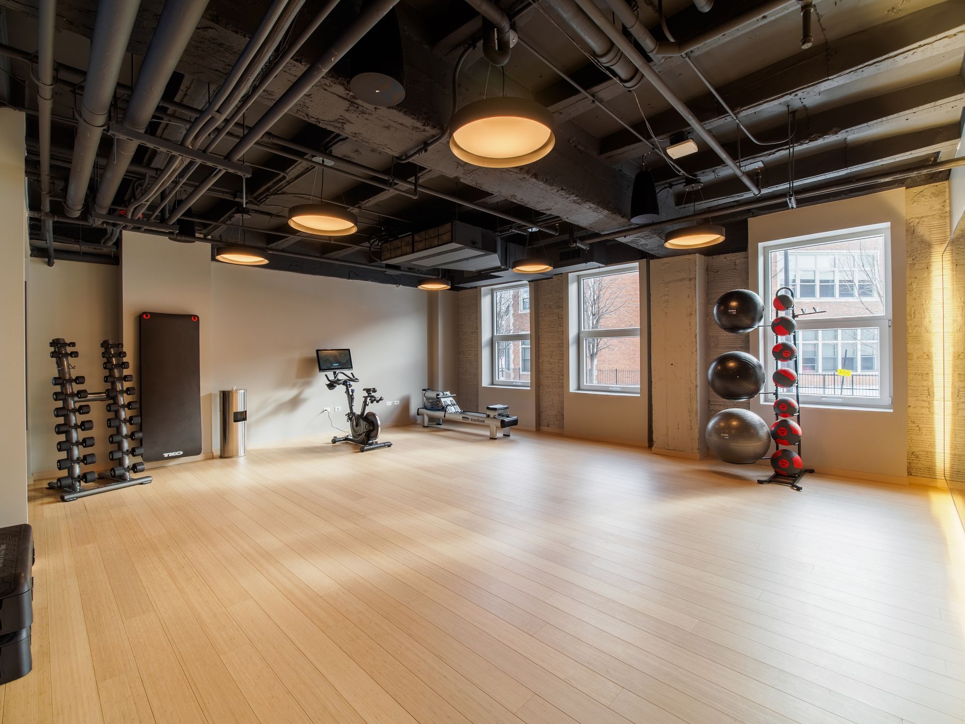 private spacious fitness room with exercise equipment
