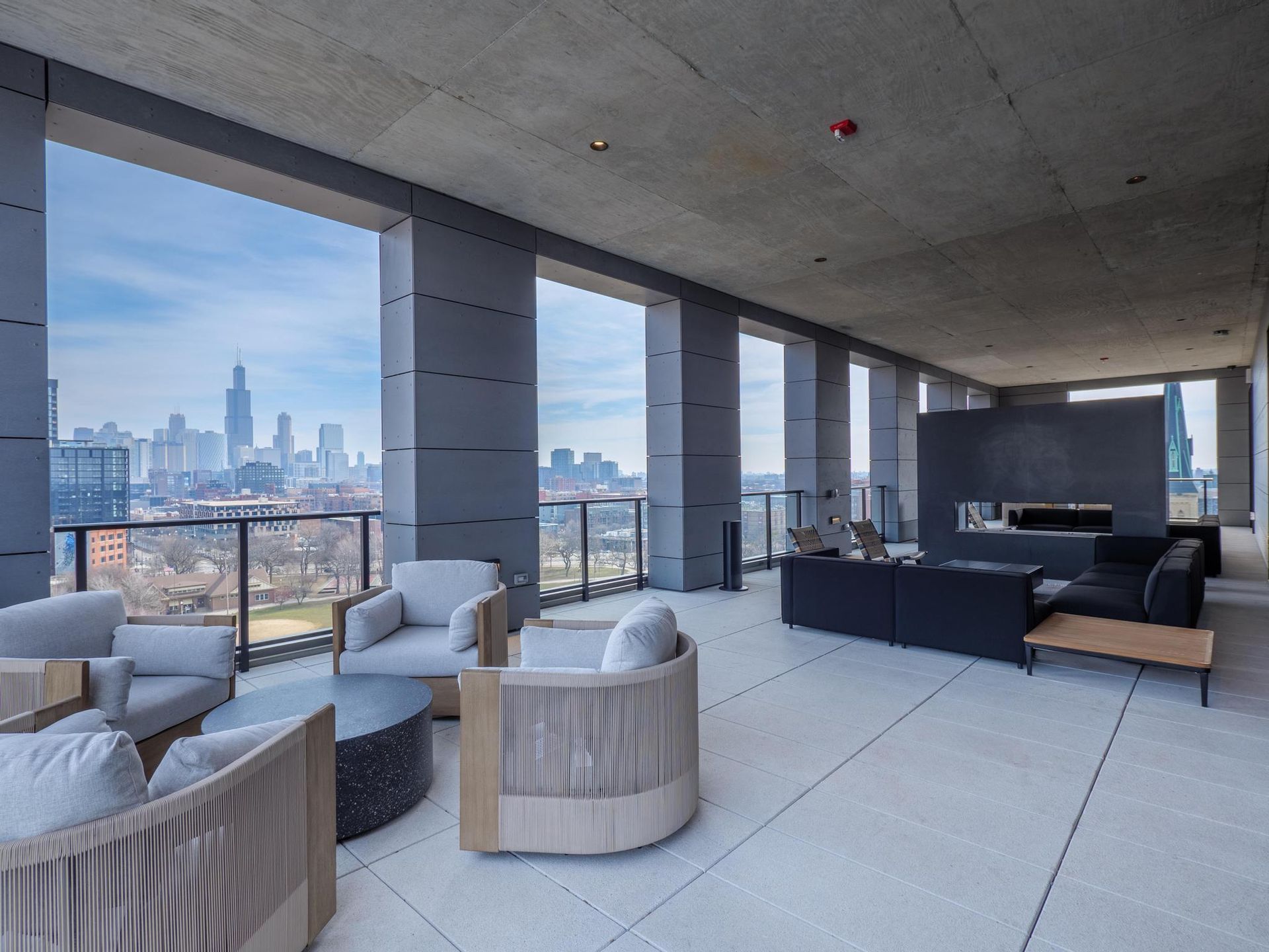 outdoor rooftop lounge with views of Downtown Chicago