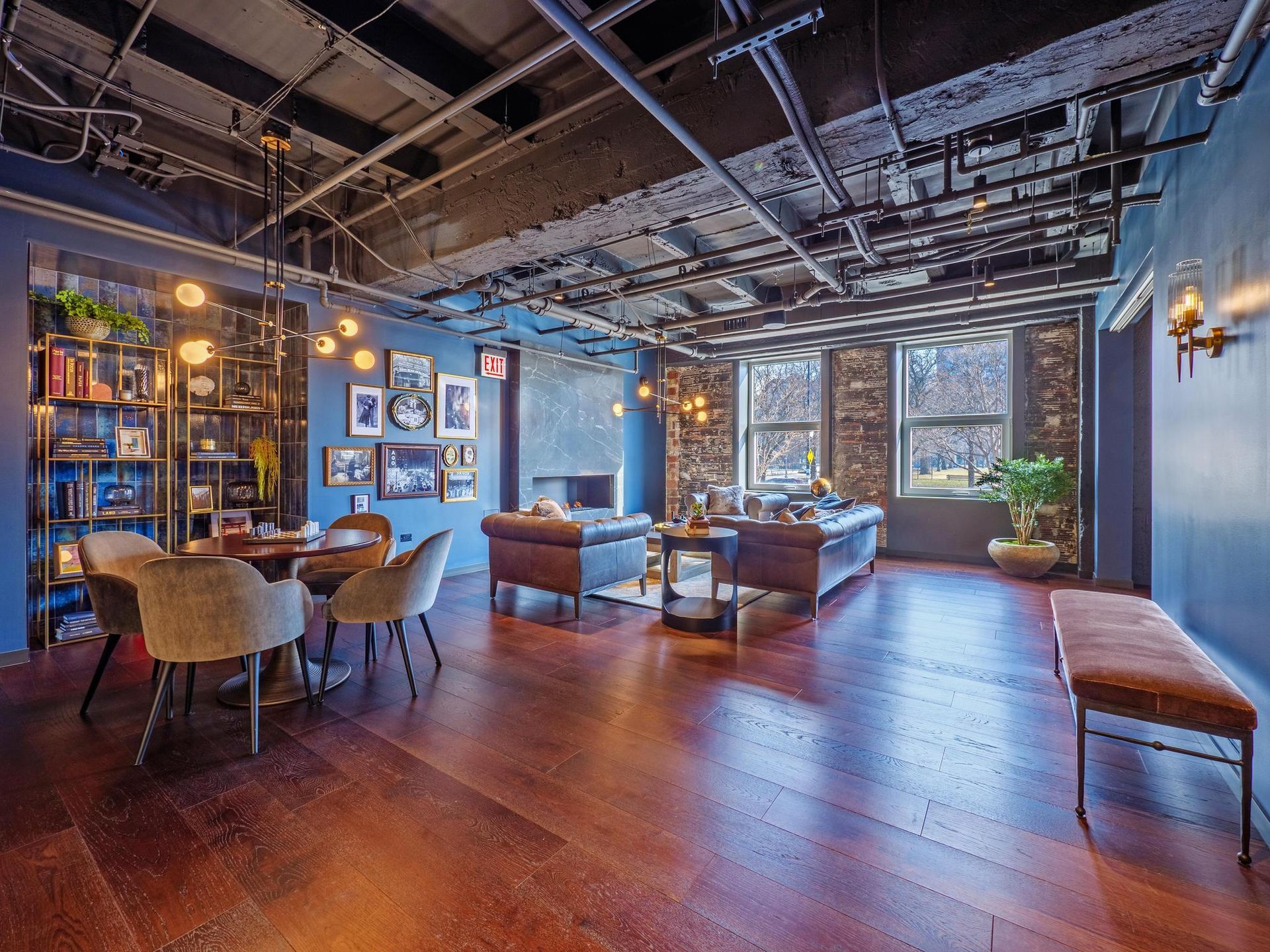 a table and couches in The Thompson at Fulton Market's resident lounge