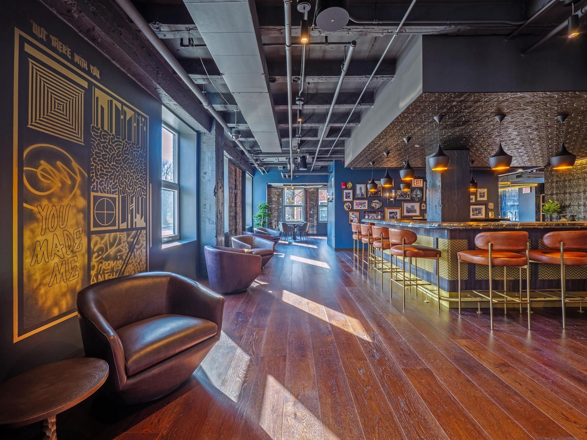seating and a bar in the resident lounge at The Thompson at Fulton Market