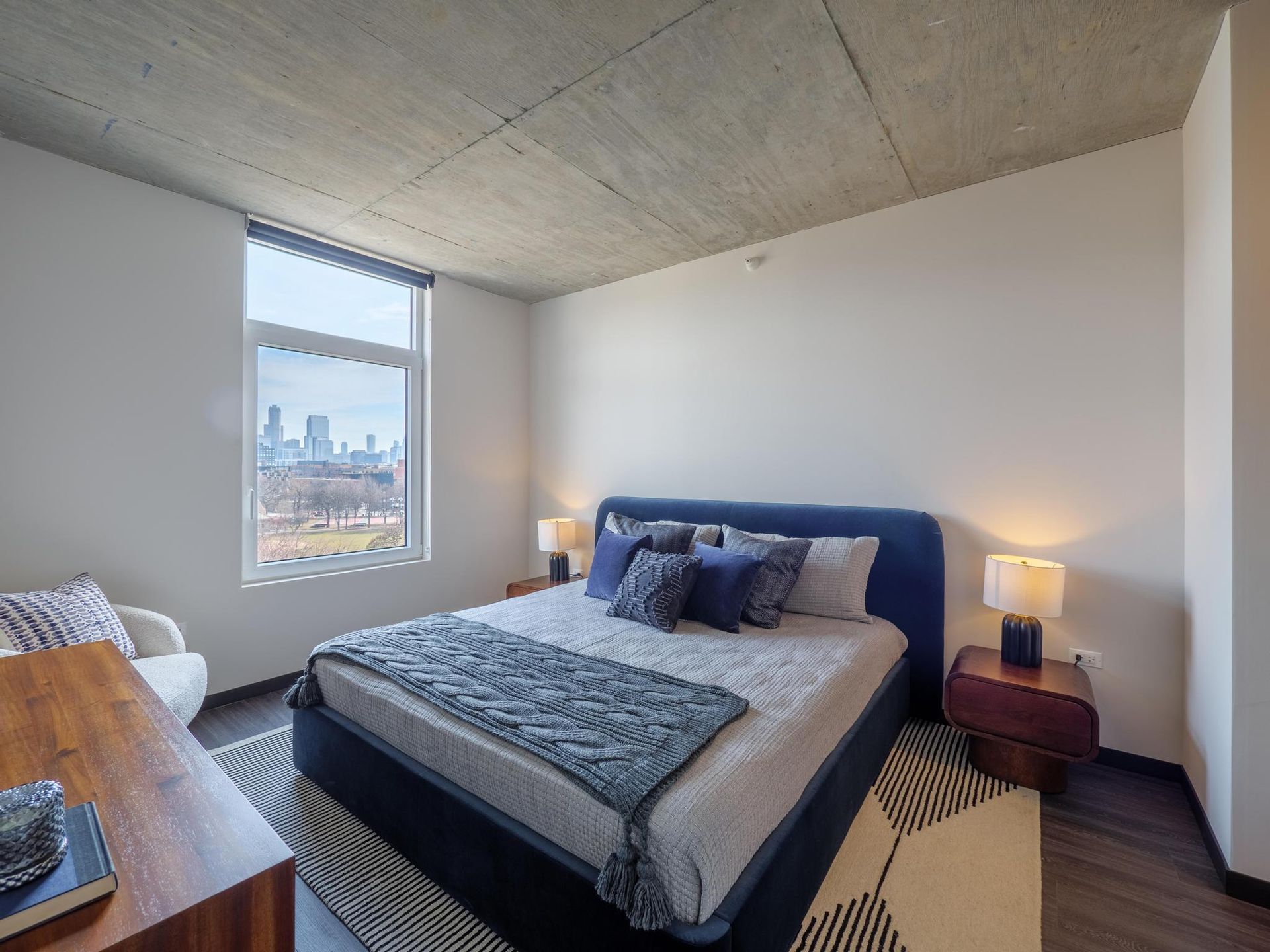 furnished bedroom with views of Downtown Chicago, IL