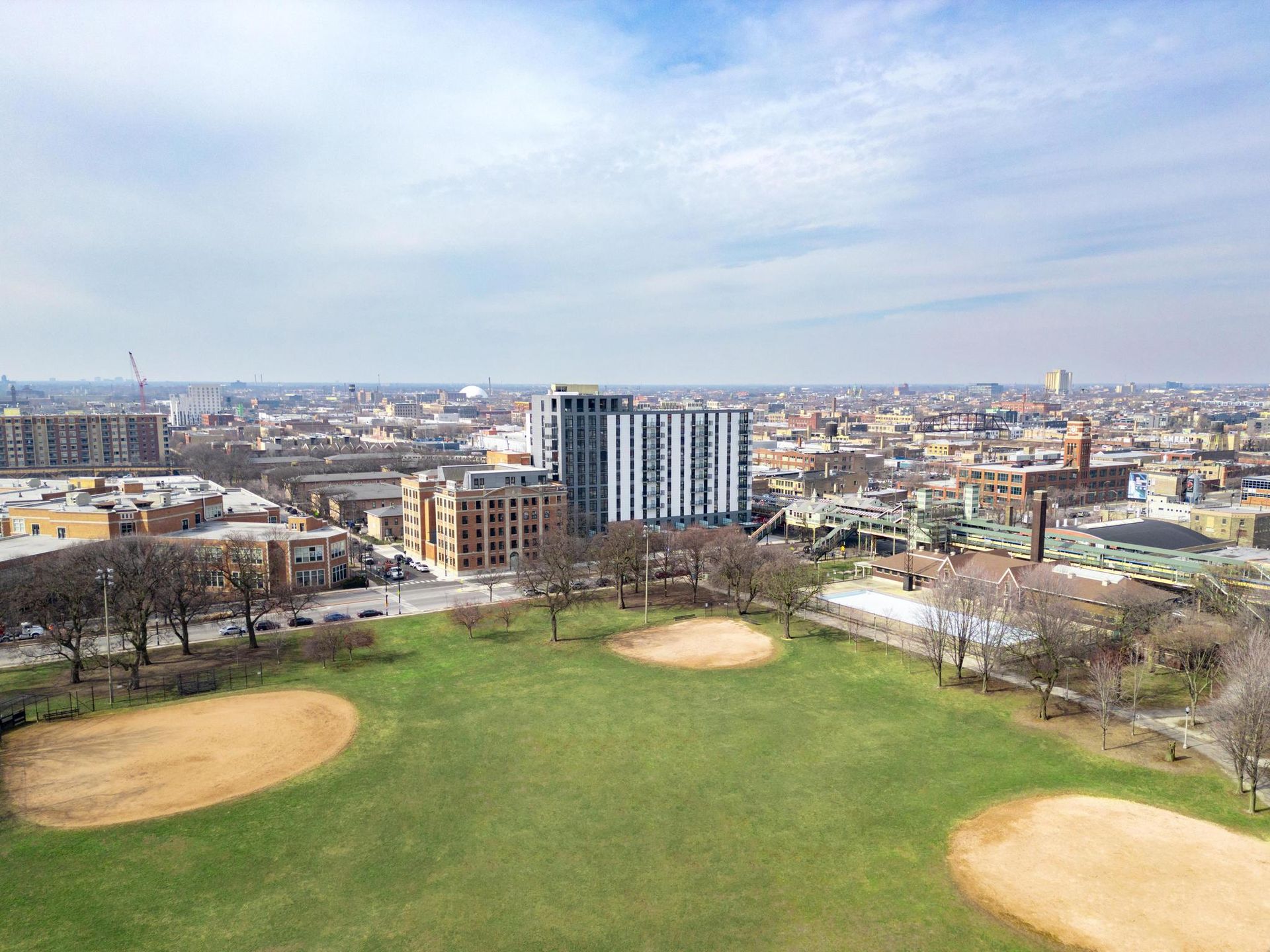 aerial view of Union Park in front of The Thompson at Fulton Market apartment building