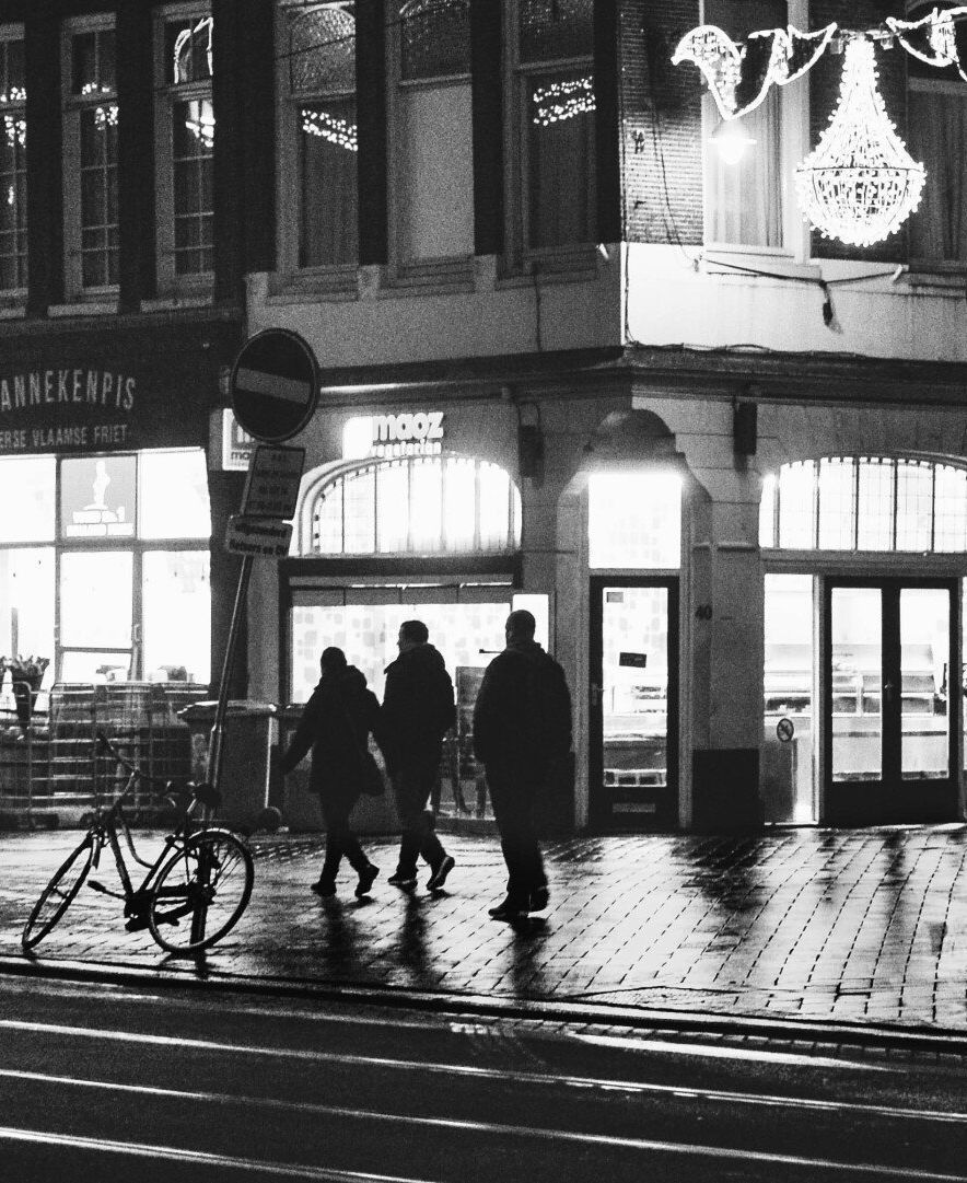 black and white photo of people walking in downtown Chicago
