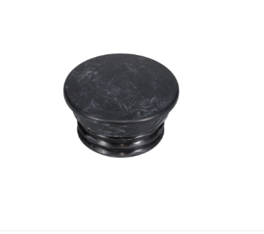 Tapón de goma negro para pipa con laterales acanalados sobre fondo blanco.