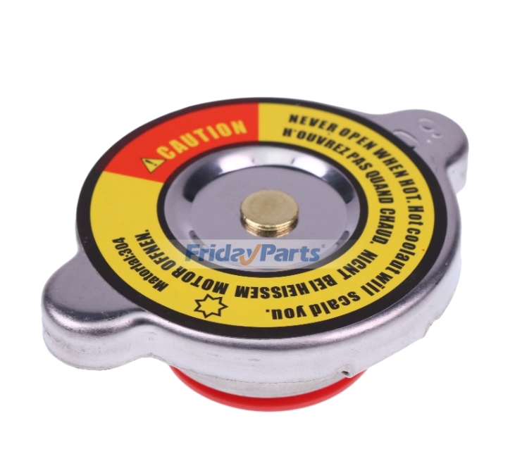 Primer plano de un tapón de radiador plateado con una etiqueta de advertencia roja y amarilla y texto negro.