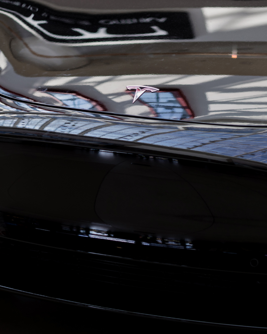 A close up of a car wheel with a mercedes logo on it