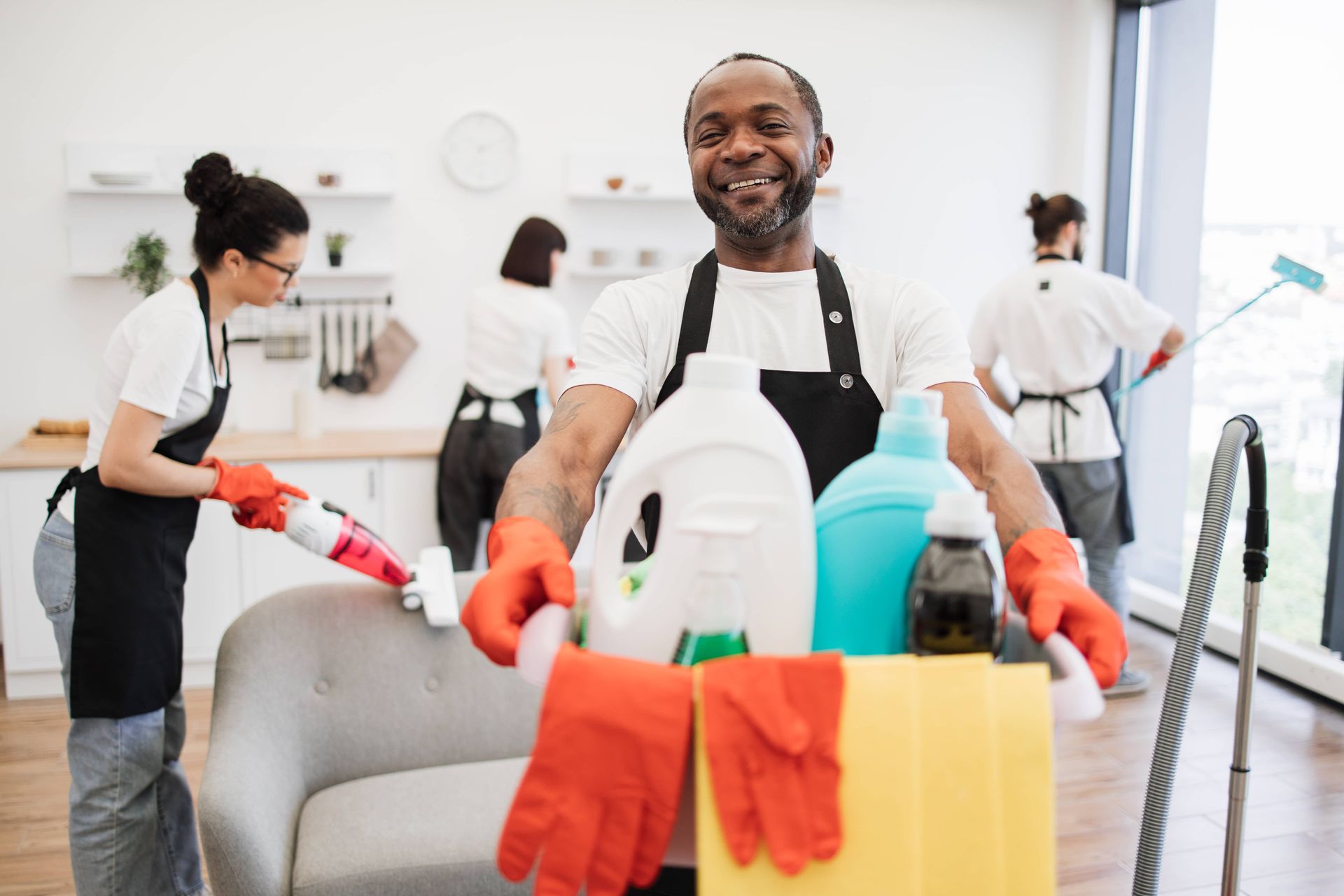 African man professional cleaning worker for EDM Home Services