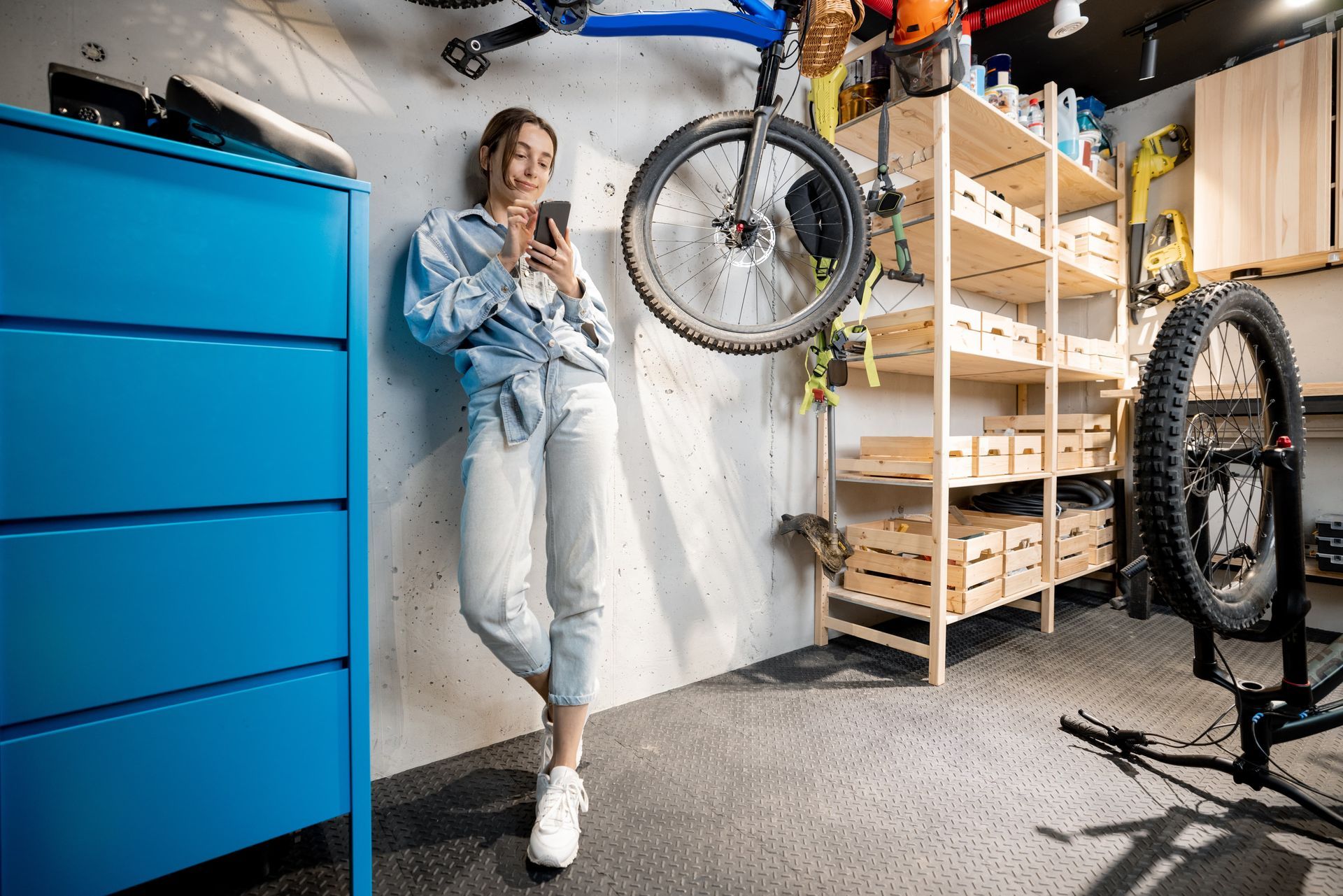 Handywoman in the workshop or garage for EDM Home Services