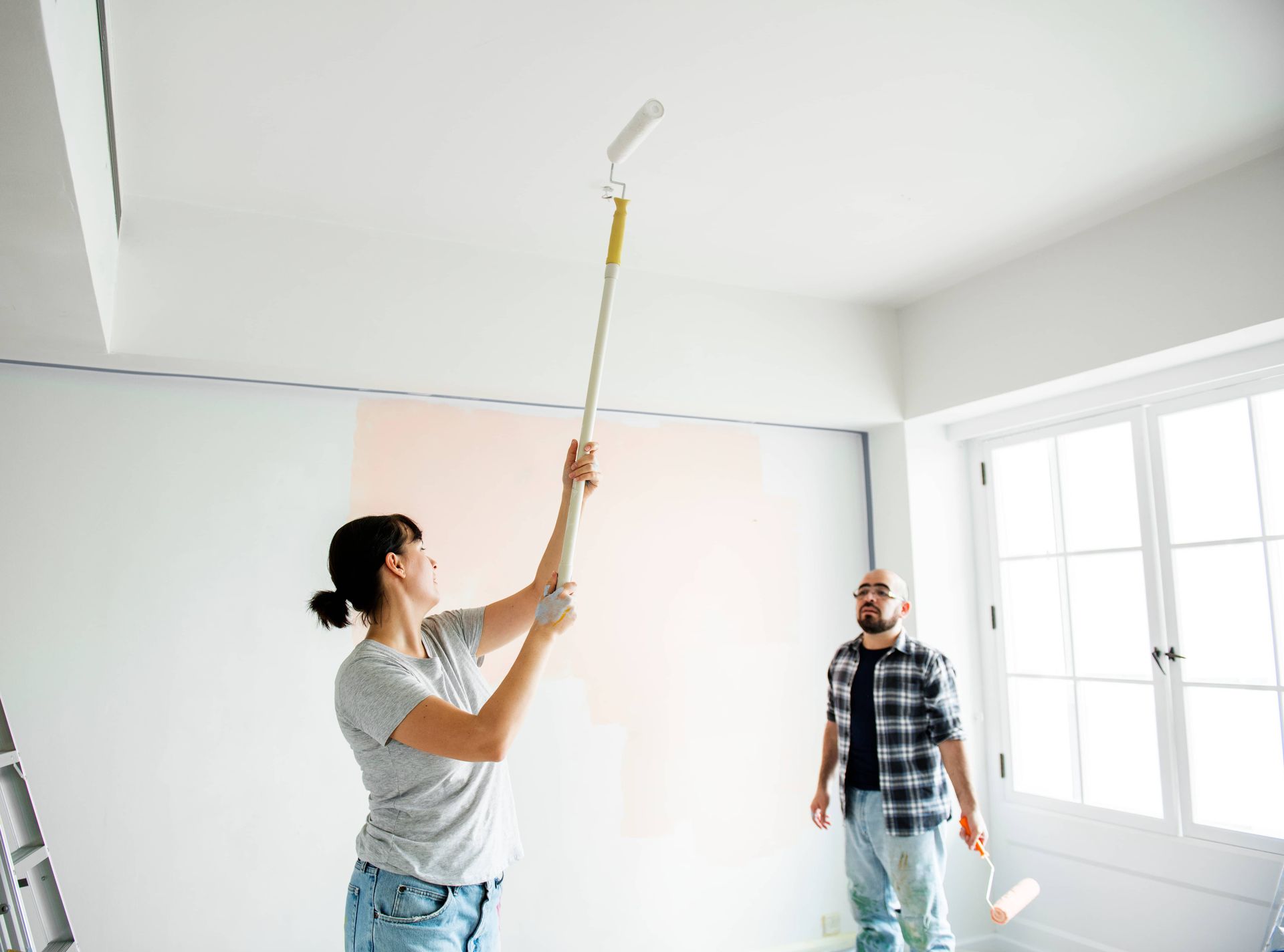 People renovating the house for EDM Home Services