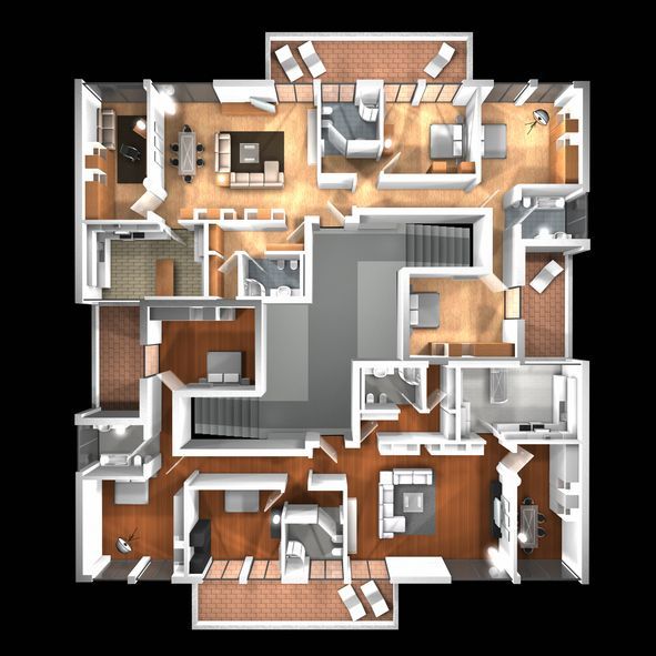 Two construction workers are looking at a blueprint in a building under construction.