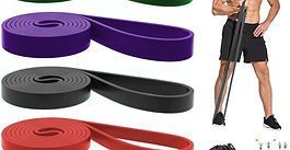 Resistance bands in purple, black, and red with a person demonstrating a leg workout