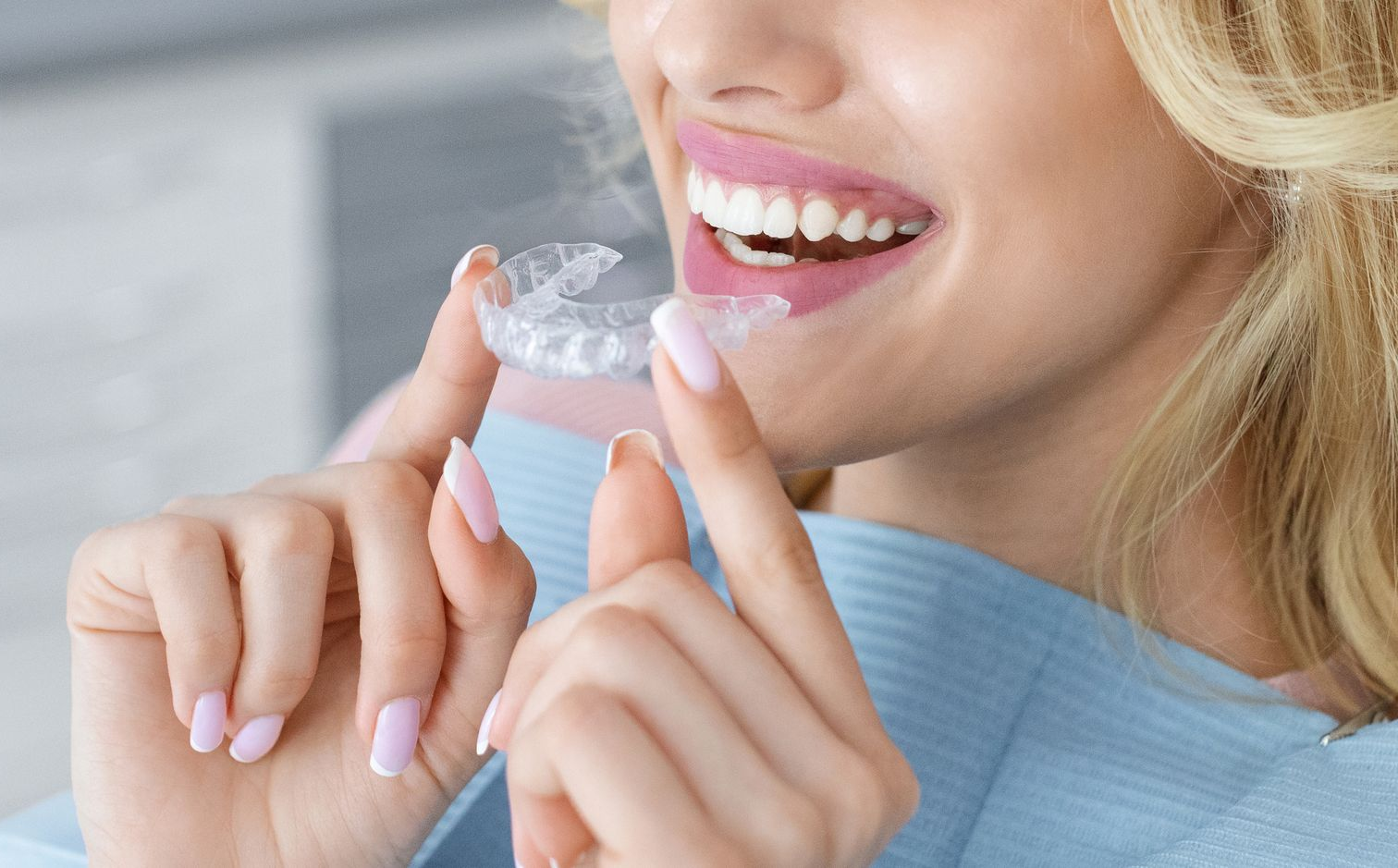 Patient at Wallington Dental in Clifton, NJ, getting cosmetic dentistry solutions.