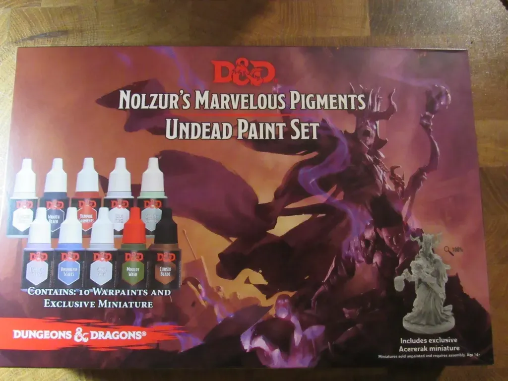 D&D Nolzur's Marvelous Pigments Undead paint set. Box shows undead figure, paint bottles, and a miniature.