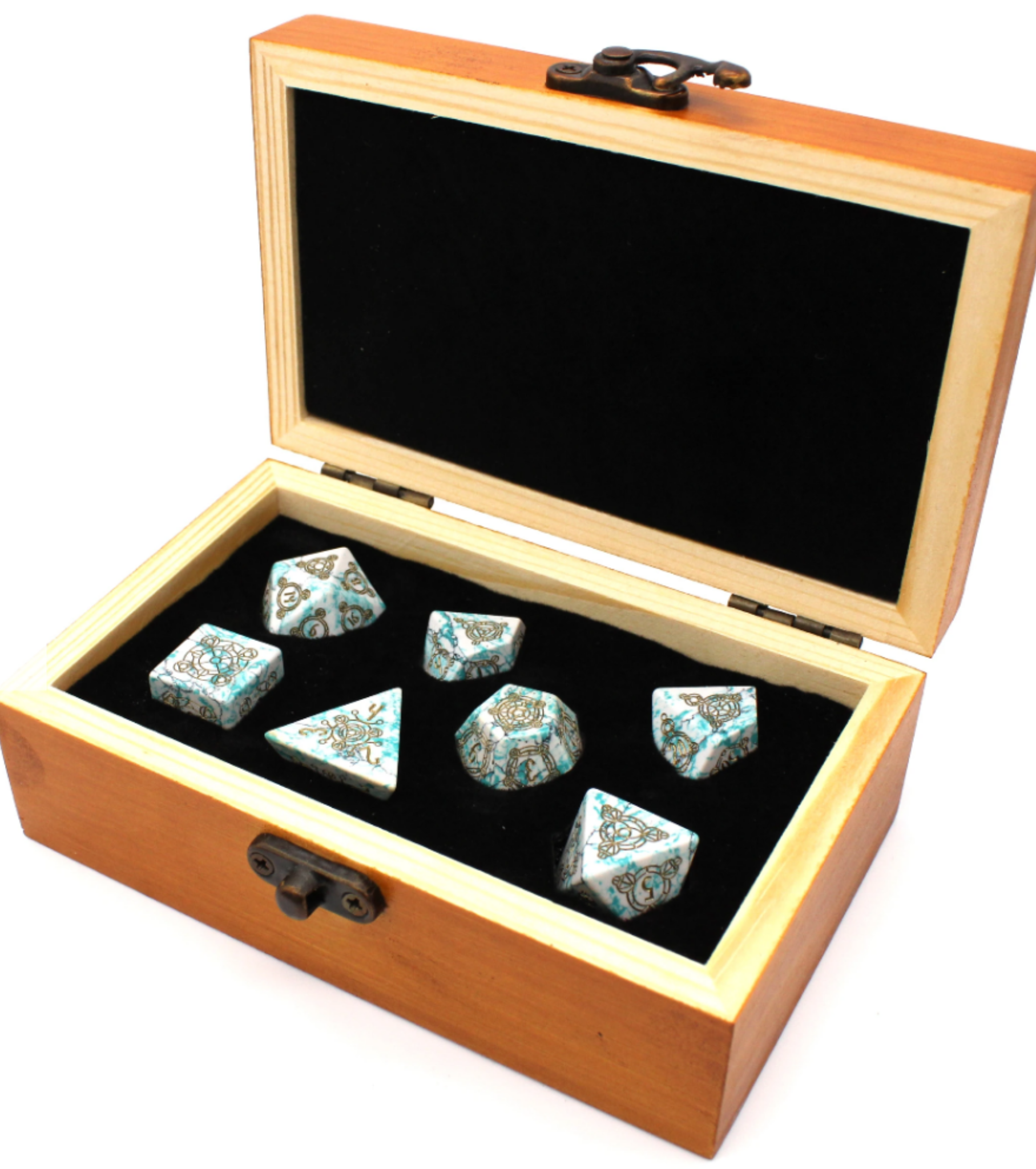 Wooden box with turquoise and silver dice set on black velvet.