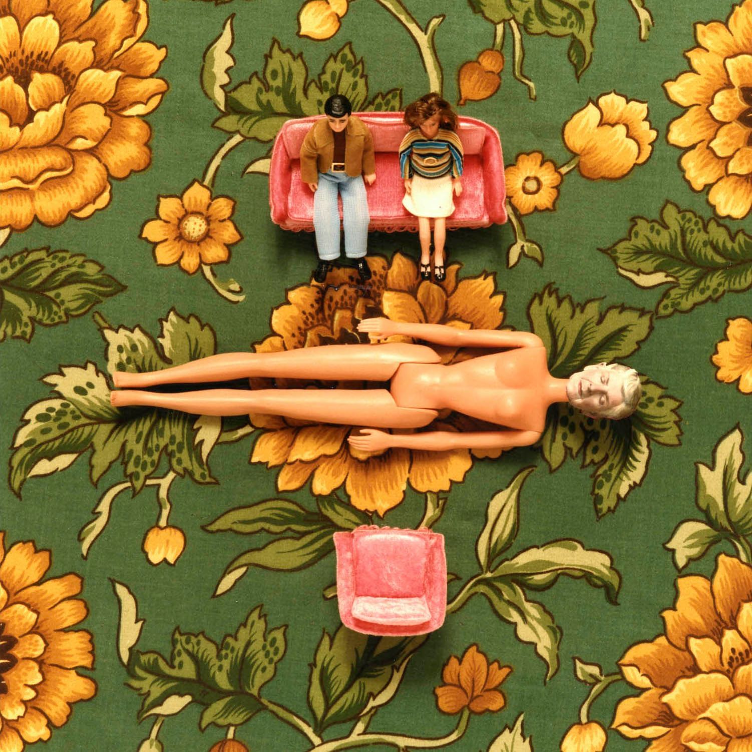 Dolls and masks were assembled in topographical manner into constructed tableaux on the scale of children’s playthings. However, although the images reveal close detail, familiar visual logic does not operate in this work, rather the experience is surrealistic. The eight images, presented as diptychs, tell a story about birth and death, in a series of opposites, extremes, or limits. 
These images were inspired by the death of the photographer Murray Johnston, who died on the 3rd of January 1990, shortly after my first child was born.
They were published in Portfolio Magazine in 1990 and exhibited in the solo show at Stills Gallery in Edinburgh in 1989.