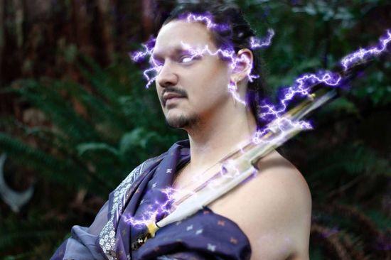 A man holding a lightning bolt representing Zeus.