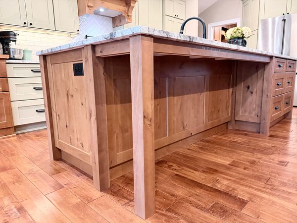 Quinn and Paul at Wood and Stone Cabinet Design Studio in Erlanger, Kentucky — family-owned cabinet design and remodeling