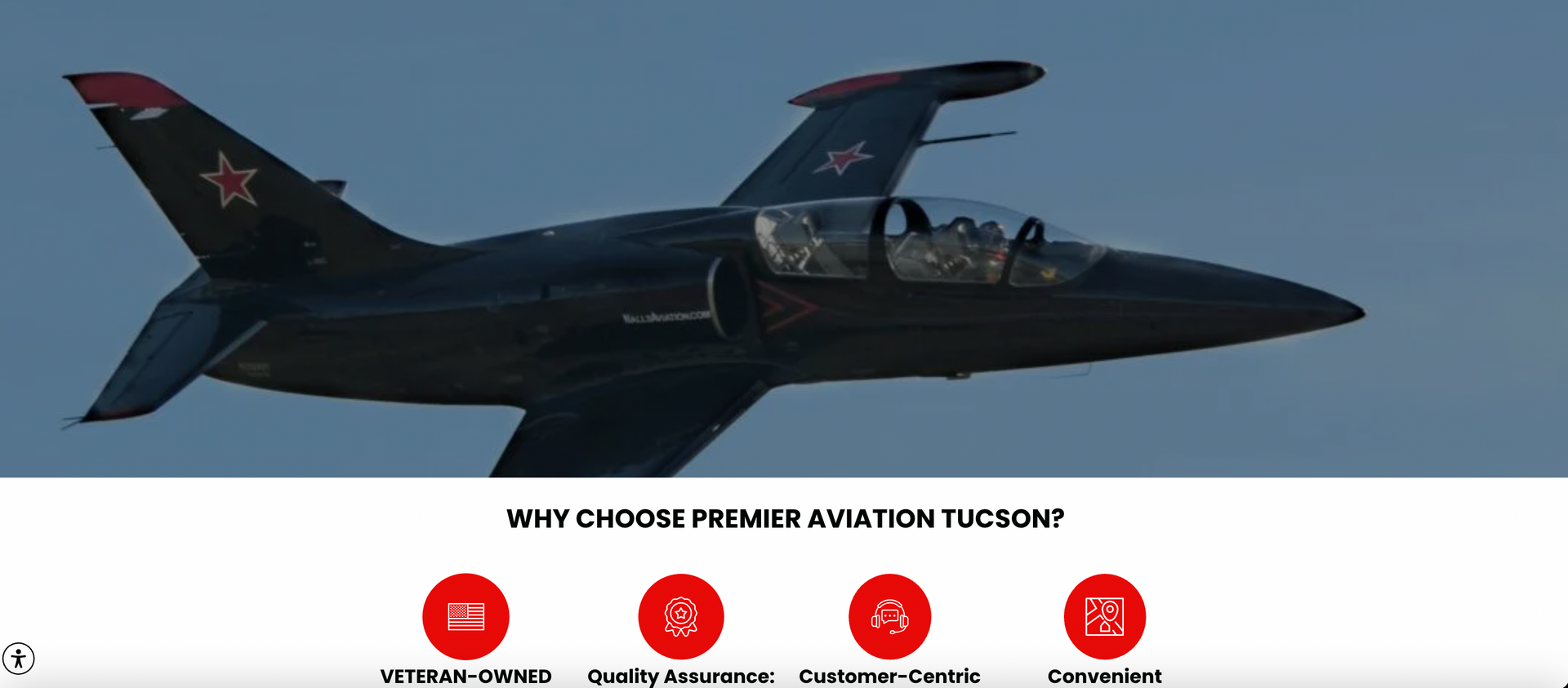 Black jet aircraft flying against a blue sky, with a row of red feature icons below