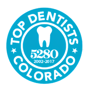 Blue circular Top Dentists Colorado logo with a tooth icon and “5280 2002-2017” text