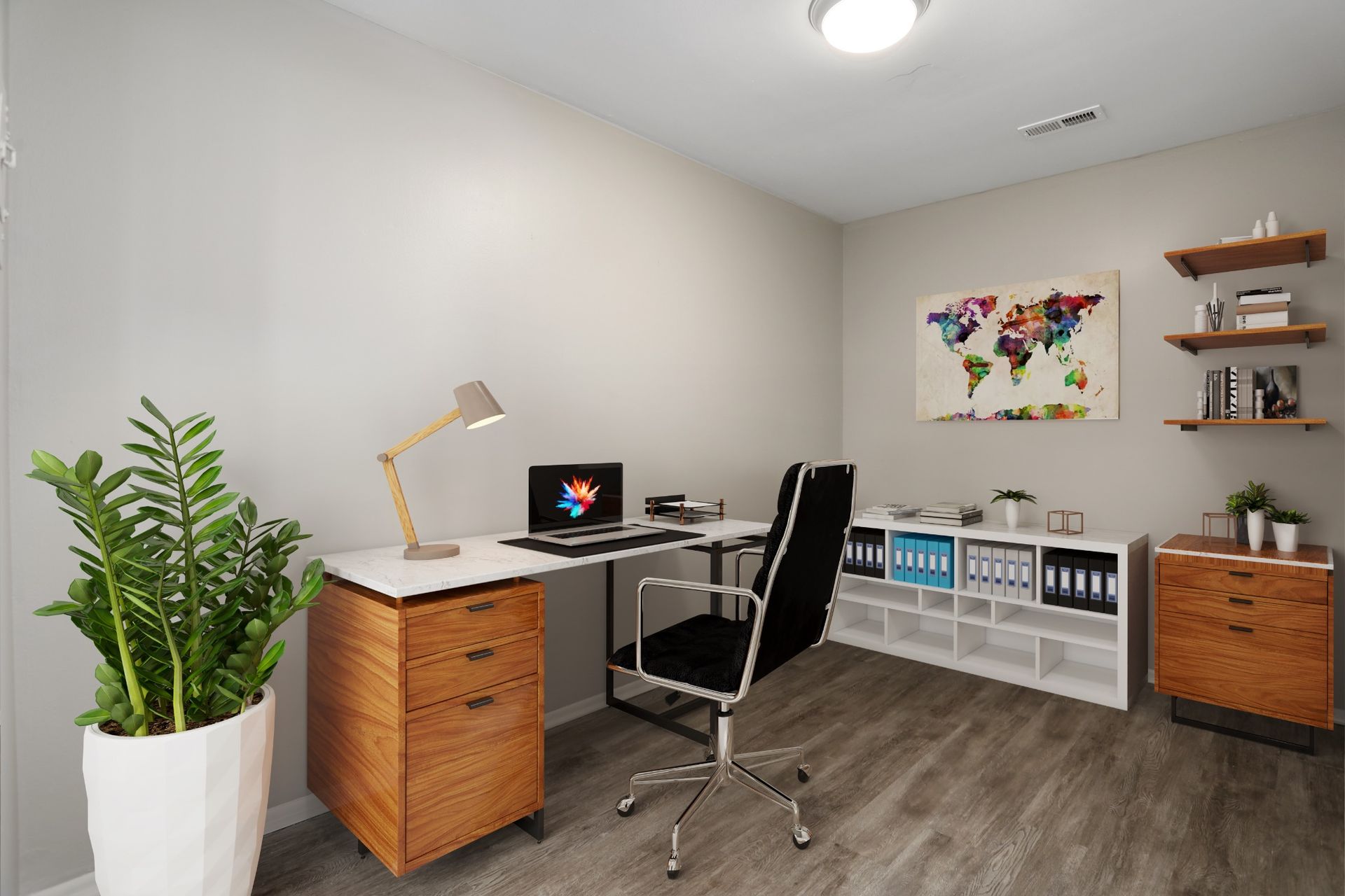 Modern home office with desk, computer, black chair, plants, shelves, and wall art