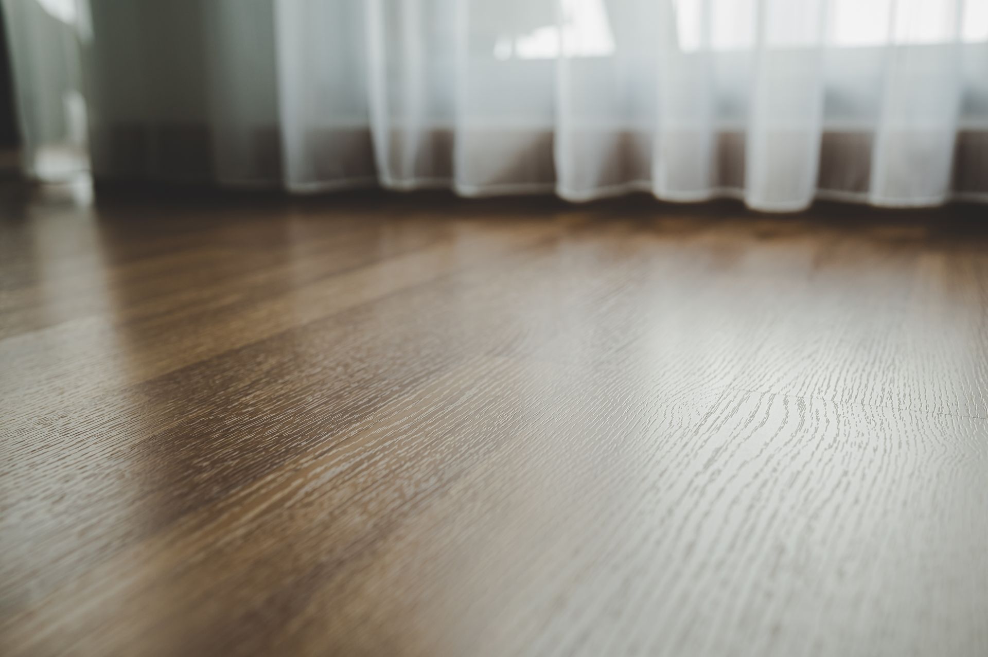 Tasmanian oak timber flooring in a modern residential living room. Tasmanian oak timber flooring in a modern residential living room.