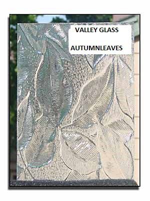 Silver leaf-patterned glass plaque labeled “VALLEY GLASS AUTUMN LEAVES”