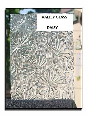 Textured frosted glass panel labeled “VALLEY GLASS DAISY” with floral pattern