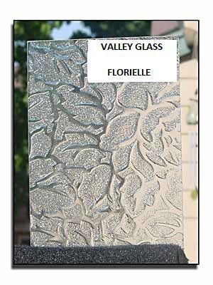 Textured glass sample labeled “Valley Glass Florielle” in silver and white tones