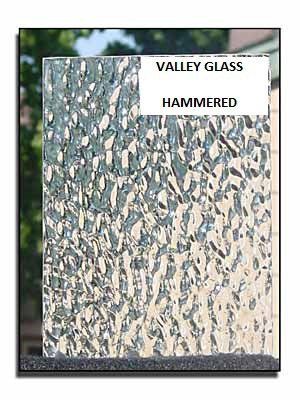 Textured glass sample labeled “VALLEY GLASS HAMMERED” in a frame.